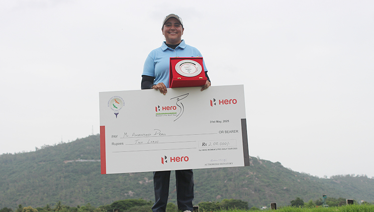 Winner Amandeep Drall with giant cheque & trophy