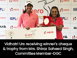 Vidhatri Urs receiving winner's cheque & trophy from Mrs. Shiraz Saheed Singh, Committee Member-DGC