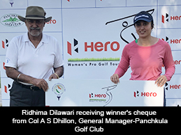 Ridhima Dilawari receiving winner's cheque from Col A S Dhillon, General Manager-Panchkula Golf Club