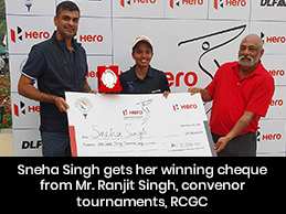 Sneha Singh receiving winner's trophy and cheque