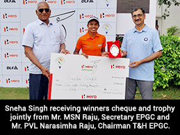 Sneha Singh receiving winners cheque and trophy jointly from Mr. MSN Raju, Secretary EPGC and Mr. PVL Narasimha Raju, Chairman T&H EPGC.