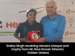 Sneha Singh receiving winners cheque and trophy from Mr. Ravi Grover-Director, Golden Greens