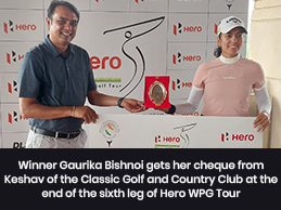 Winner Gaurika Bishnoi gets her cheque from Keshav of the Classic Golf and Country Club at the end of the sixth leg of Hero WPG Tour